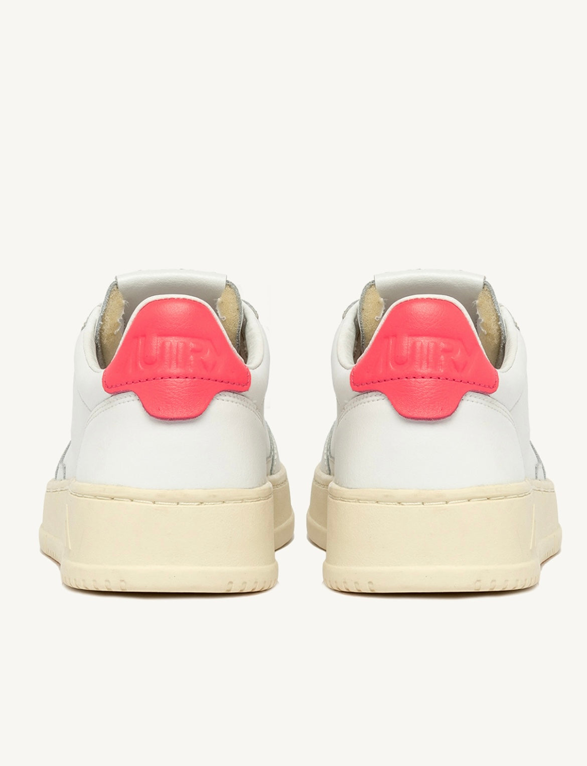 DEPORTIVAS Autry MEDALIST LOW SNEAKERS IN WHITE AND FLUORESCENT PINK LEATHER